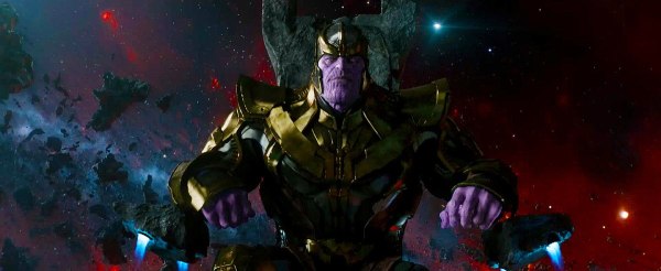 Picture of Thanos, the villain of Infinity War, sitting down in space.